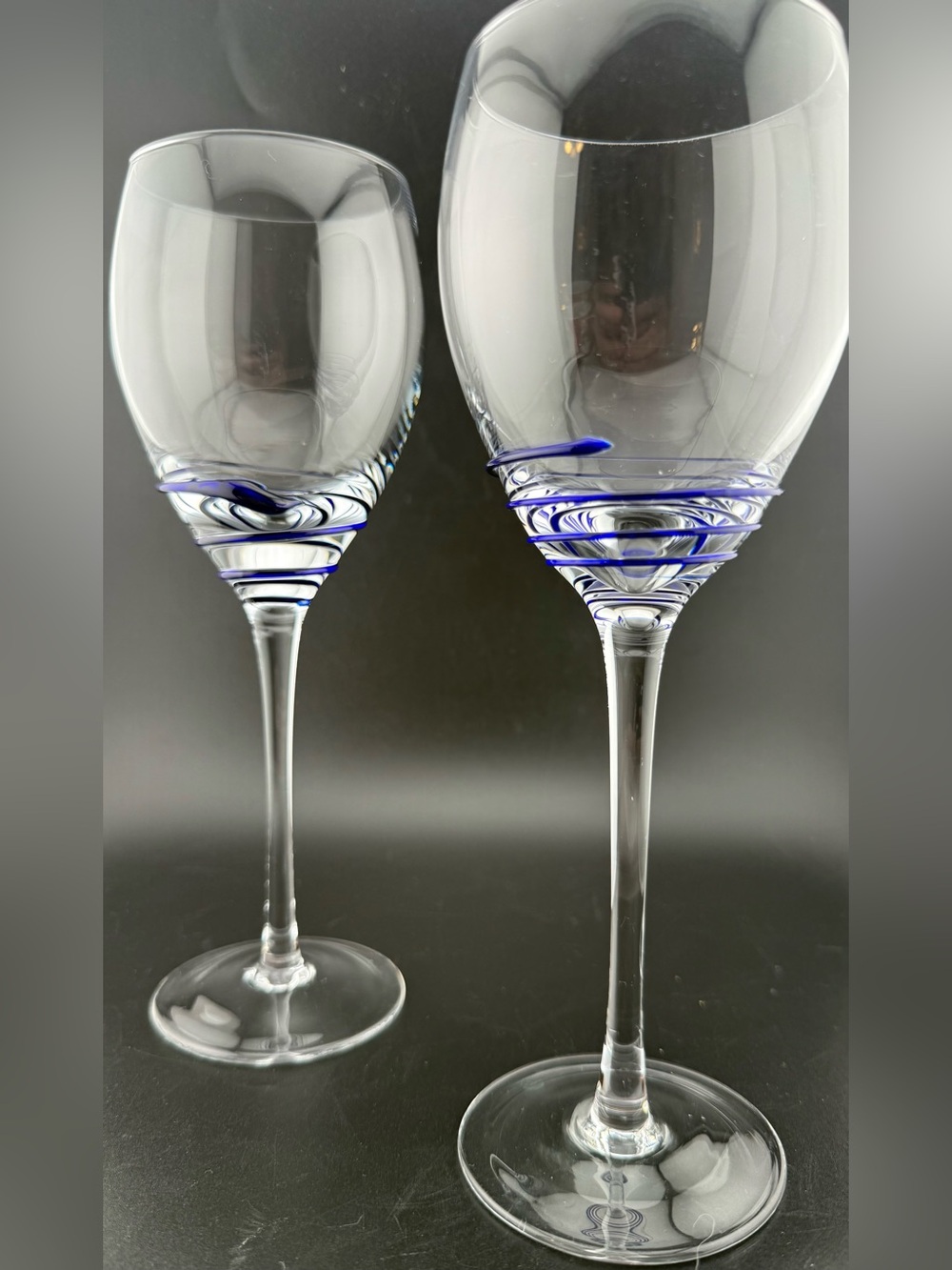 2 Pier 1 P1C44 blue swirl wine glasses. 10oz